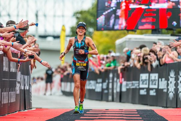 IRONMAN runner reaching the finish line